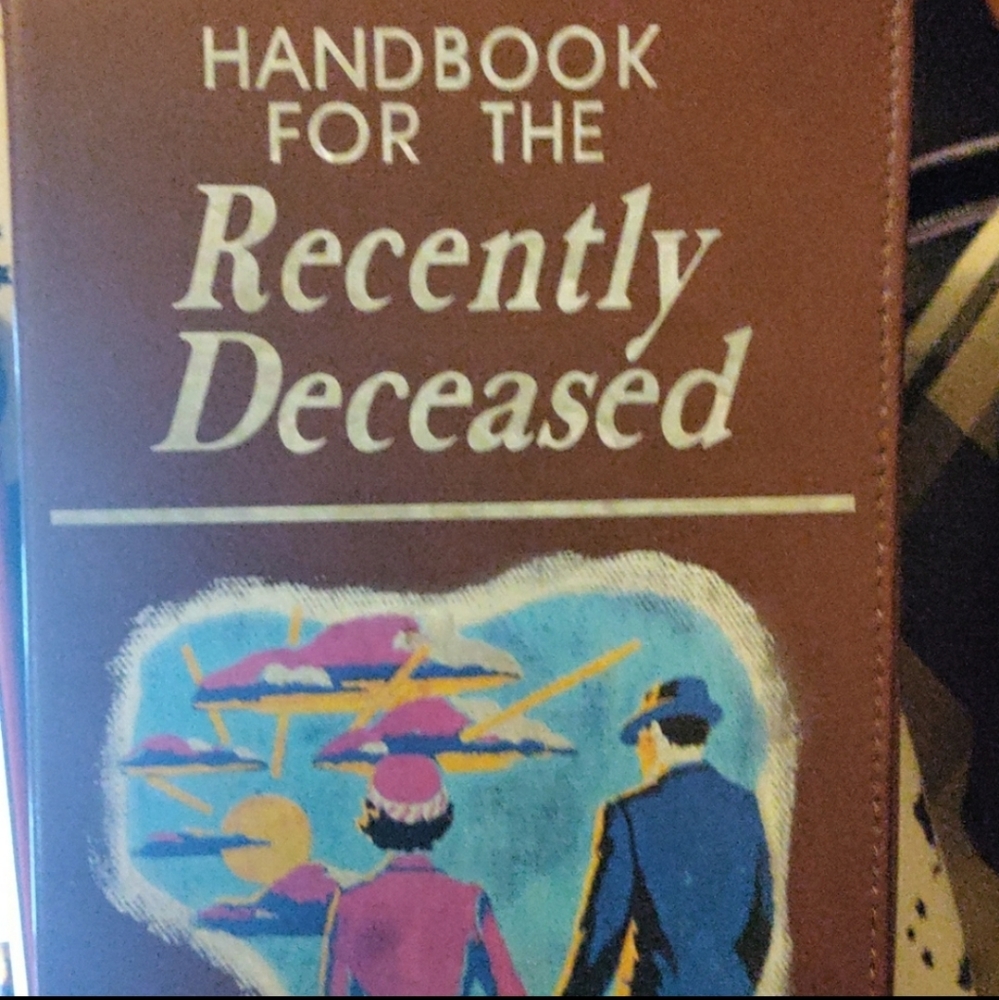 Handbook for the recently deceased cross body